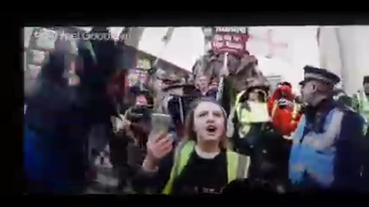 PROTESTER THREATENS JOUNALIST CAUGHT ON CAMERA