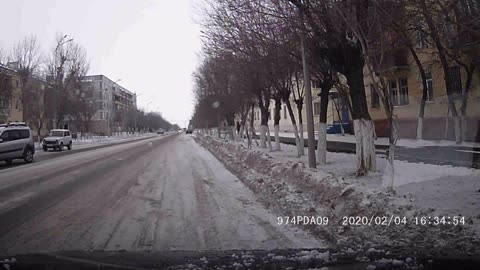 Pedestrian Attempts Terribly Unconvincing Fake Fall In Front Of Car