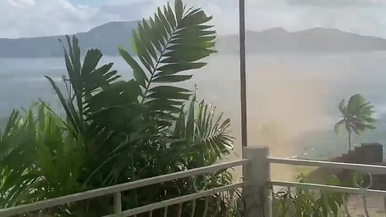 Close up video of a waterspout forming and moving on land in Fort-de-France