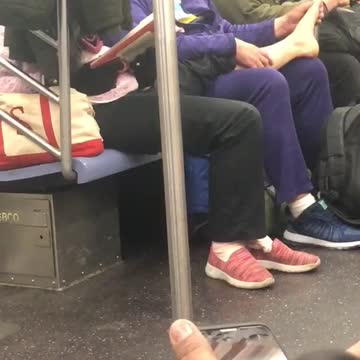 "a new york valentine" woman gives foot massage to her girlfriend on subway train