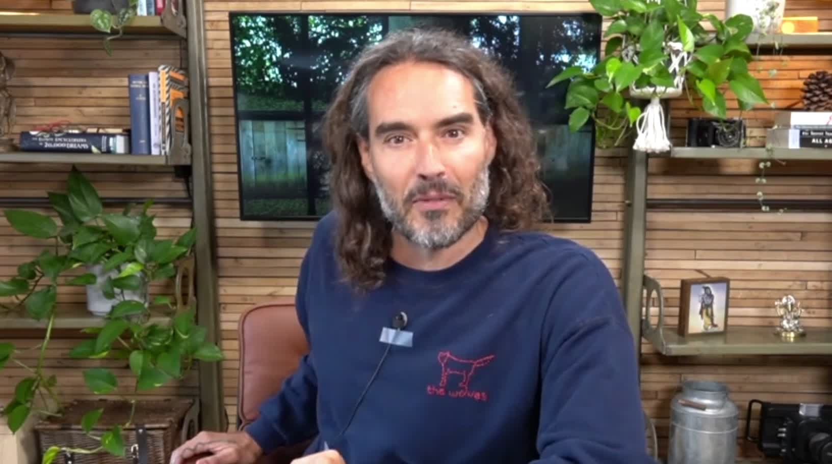 Russell Brand mocks Pelosi's attempt to dodge a question about her husband's stock purchases