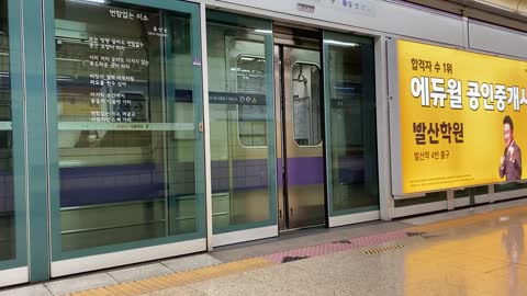 evening subway train on way home from work, Korea