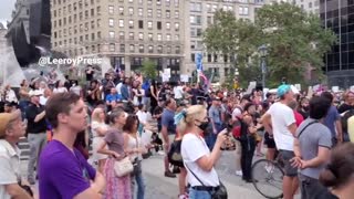 New York teacher chant "save New York" in opposition to vaccine mandates.