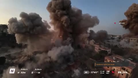 The moment Israeli forces blew up a number of buildings in the town of Houla