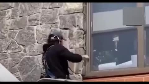 New York woman uses escalator to visit mother through window