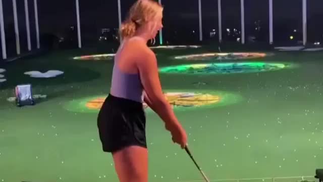 Girl fails playing golf