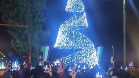 A Christmas tree lighting ceremony in Homs, Syria.