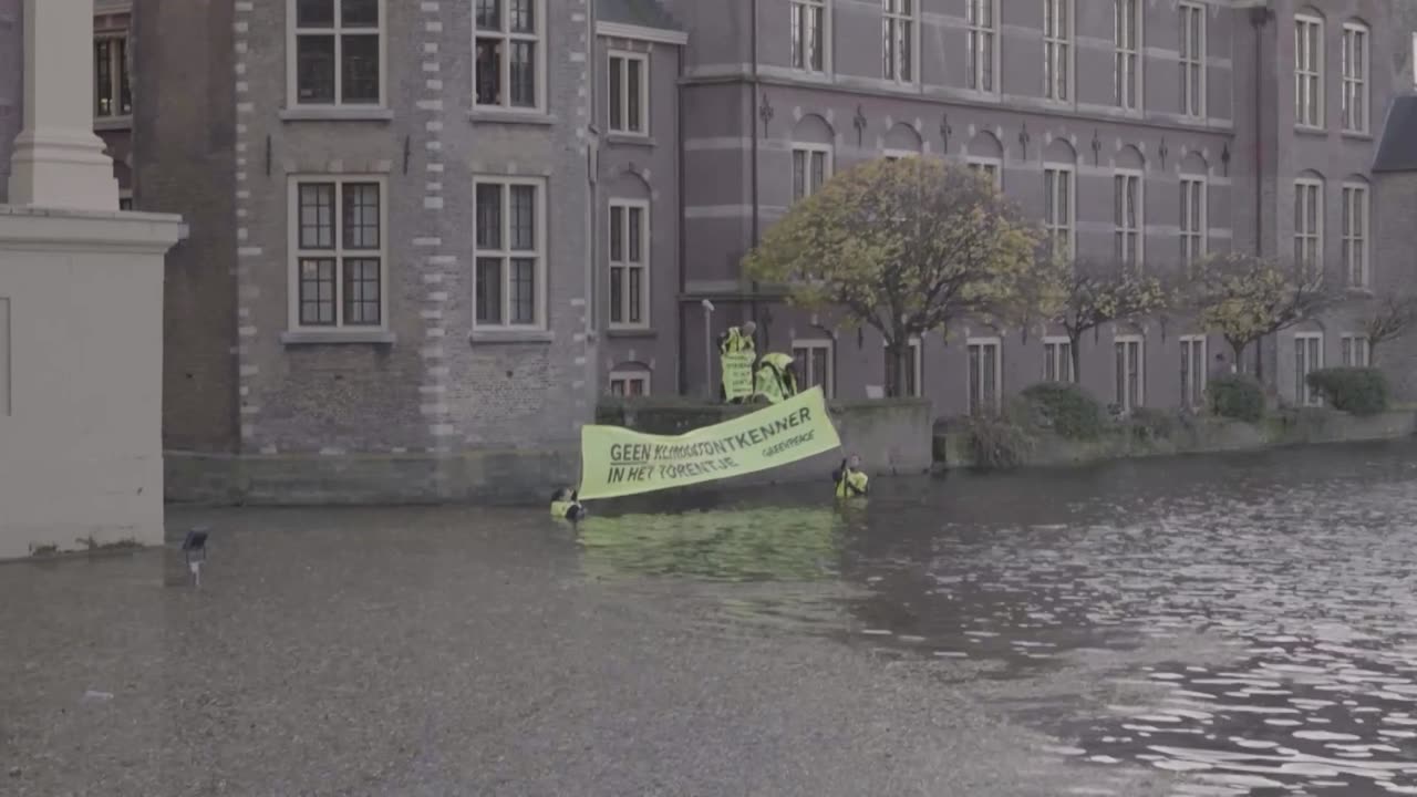 Dutch Greenpeace activists protest against Wilders