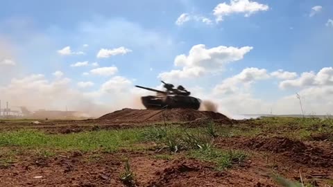 A Syrian and Russian joint military parachuting drill