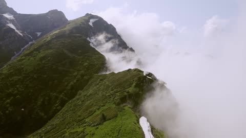 Beautiful Clouds And Mountain Scenery Shot