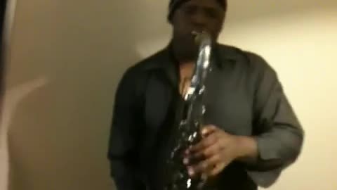 Sax player jammin to You DOn't Have to Call by Usher