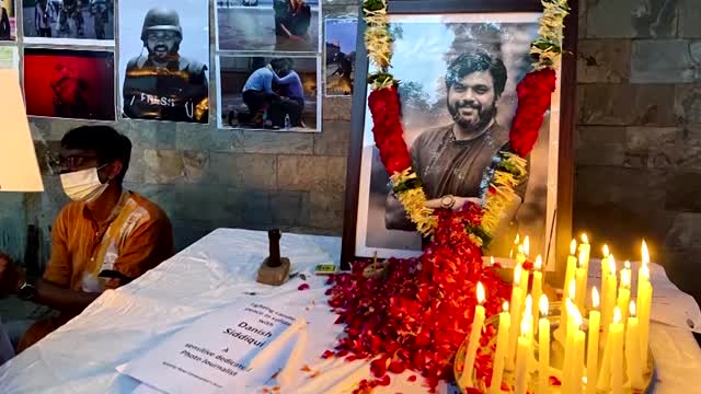 Slain Reuters journalist is buried in his hometown