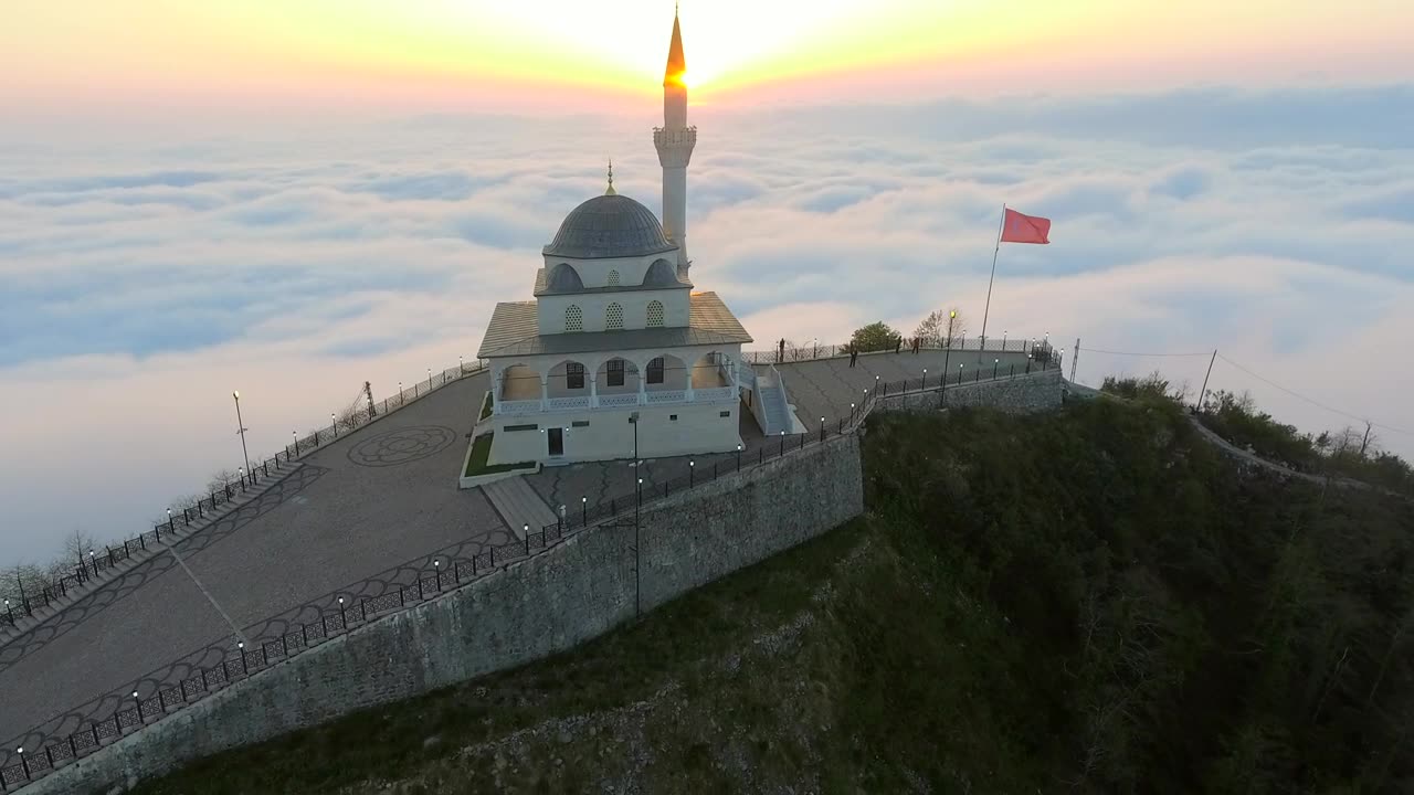 Flying away from the mosque in the mountain