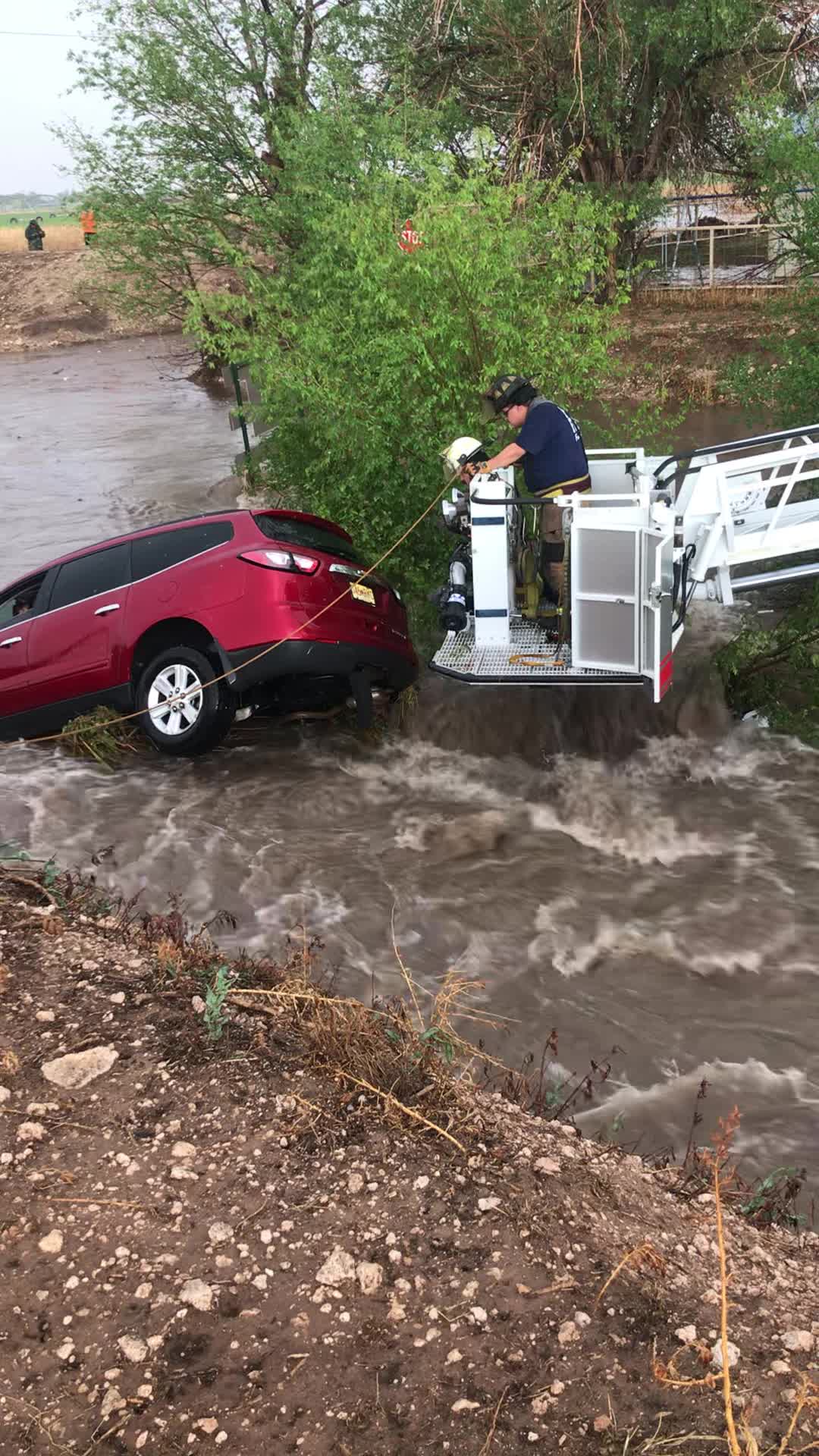 Portales Fire Department Saves Family From Car Swept by Floodwaters