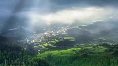 Buildings under the mountain stream