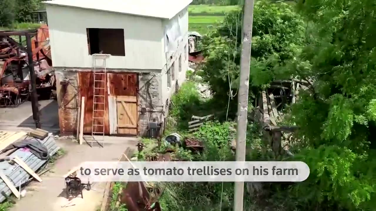 Ukrainian villager uses ammo boxes to restore his home