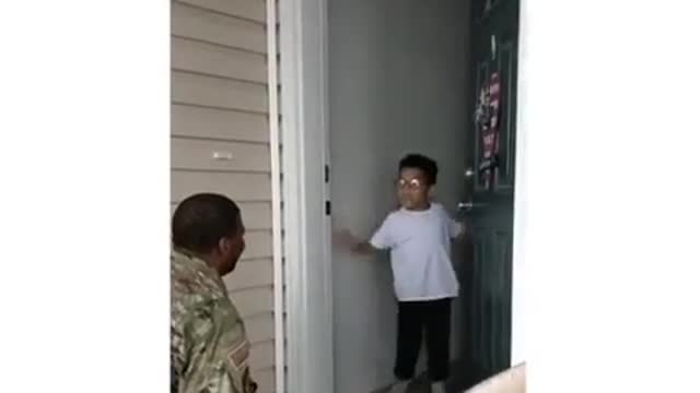 A soldier surprises his son after a long time he has not seen him - very exciting!