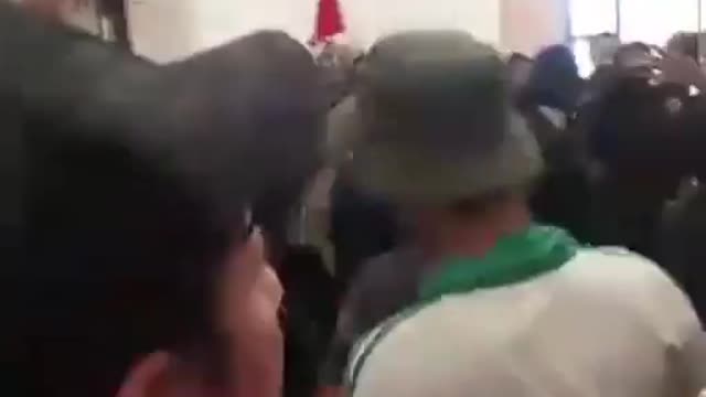 Protesters storm the Presidential Palace in Baghdad, Iraq.