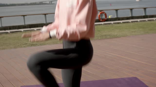 Woman Doing Jumping Exercise