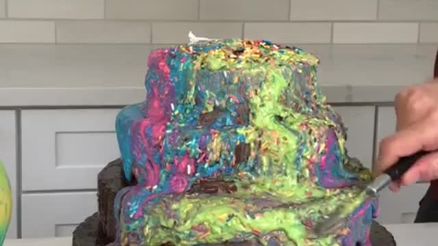 When the colors dump down the chocolate cake perfectly…