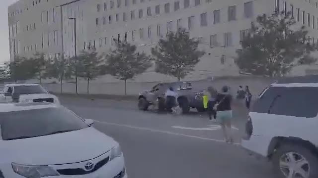 A truck driver plows into a crowd of women pro-choice protesters in Iowa