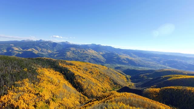 Drone Over Rocky Mountains In Autumn 4K Stock Footage Clip