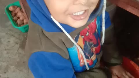 Baby eating sweet