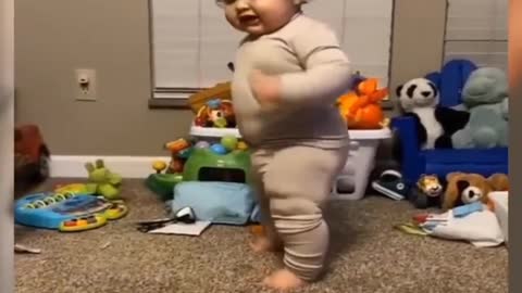 Baby running and laughing