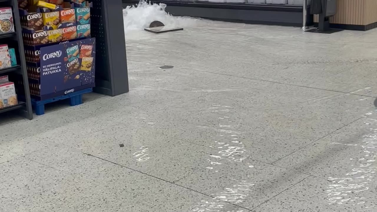 Rainwater Floods Into Grocery Store Through Drainpipe