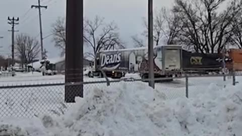 Train Slams into Milk Truck