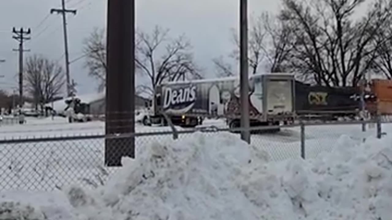 Train Slams into Milk Truck