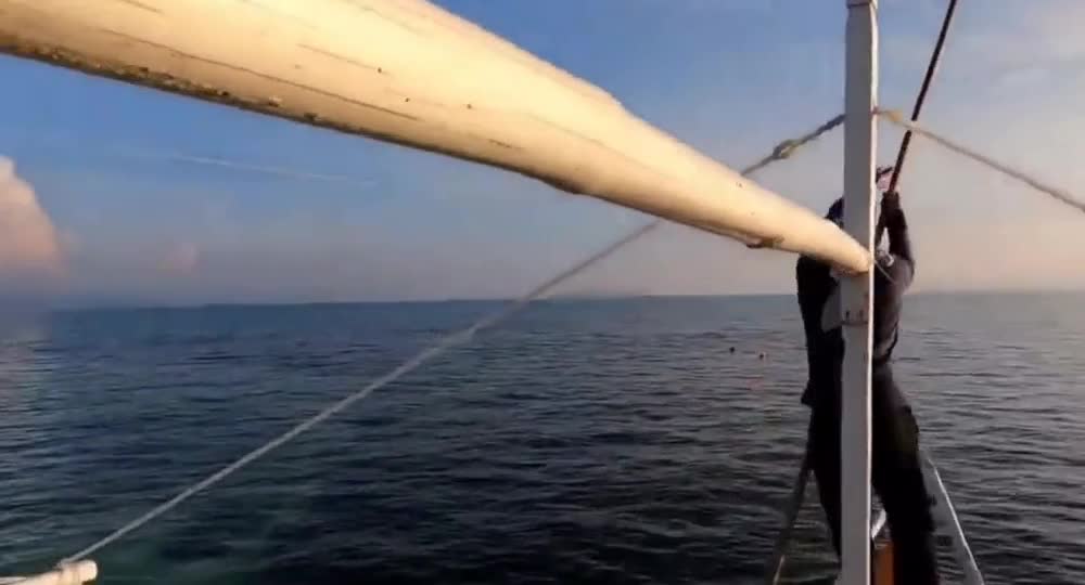 Brazilian team up to catch squid in a homemade trap