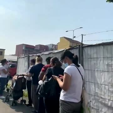 Globalist Success: The food line in the economic capital of Italy, Milan.