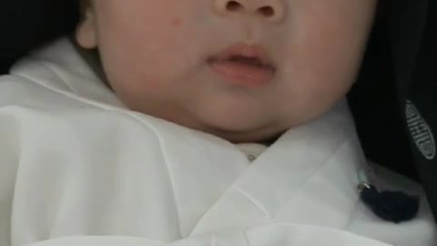 A korean boy baby at a hundred days party.