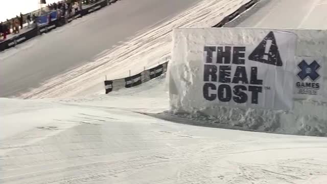 Snowboarder Slides Over Giant Jump