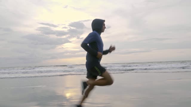 Man jogging on the beach