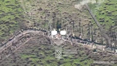 Shelling Russians Taking Cover Near an Embankment