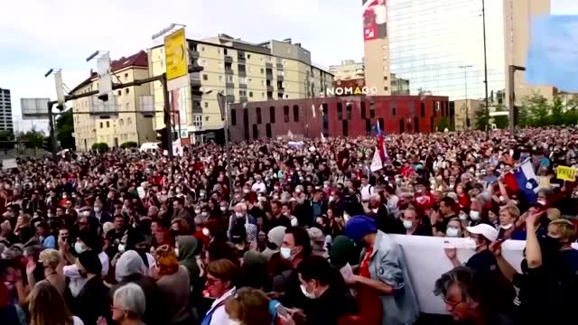 Thousands rally in Slovenia for snap elections