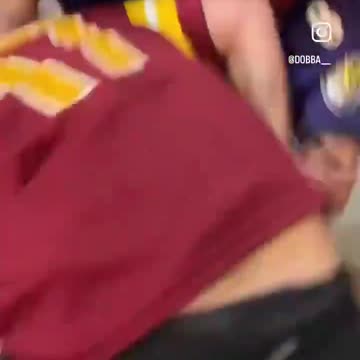 A Raven's fan roams the streets looking for Commanders fans to fight