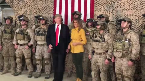 President Donald Trump and Melania Trump meet with troops
