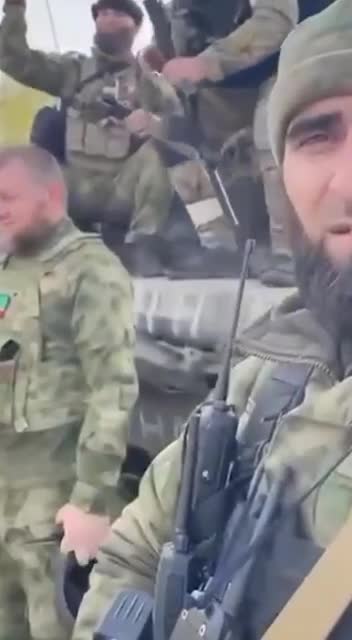 Chechen Republic are hoisting a flag on a captured T-64 abandoned by militants