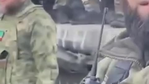 Chechen Republic are hoisting a flag on a captured T-64 abandoned by militants
