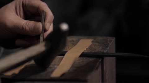 Close up of a Person Engraving a Metal Blade | HD