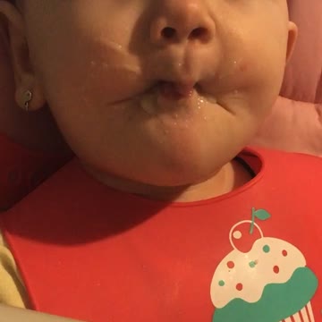 very funny baby! delicious porridge