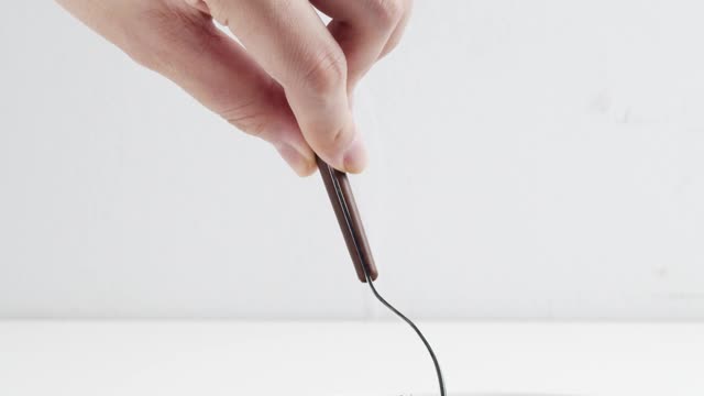 A Person Getting a Piece of Blueberry by Using a Fork