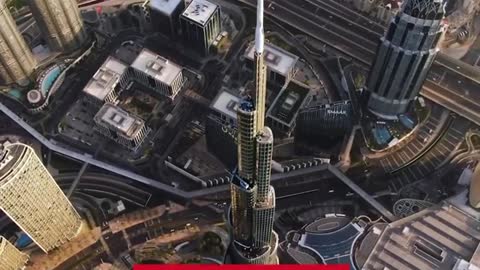 A flight attend at the top of the world Burj Khalifa