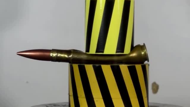 100 ton hydraulic press AGAINST CALIBER 50 CARTRIDGE