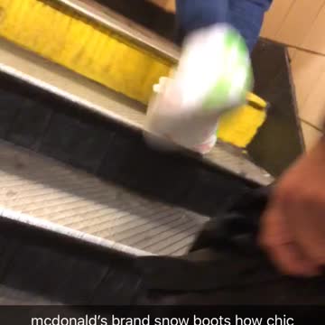 Man with mcdonalds bags on shoes