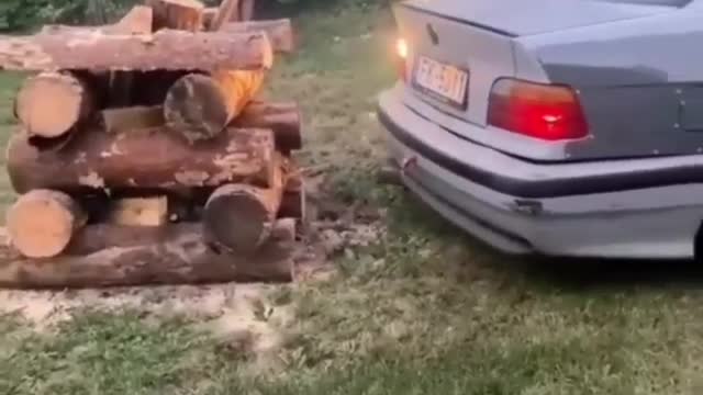 Funny Video of starting a campfire with a car exhaust