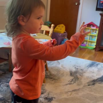 Taylin is showing Cassidy her boo-boo on her middle finger. Her sister is shocked lol.